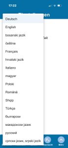 MomoZeit-App zeigt eine Sprachauswahlliste mit über 15 verfügbaren Sprachen, darunter Deutsch, Englisch, Bosnisch, Französisch, Polnisch, Rumänisch und Russisch.